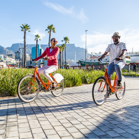 Couple riding bikes representing the idea of exploring an immediate annuity.