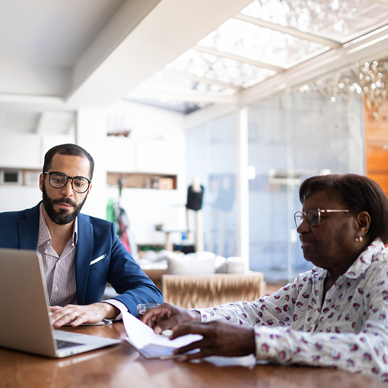 Financial professional  discusses options for enhanced income flexibility with client.