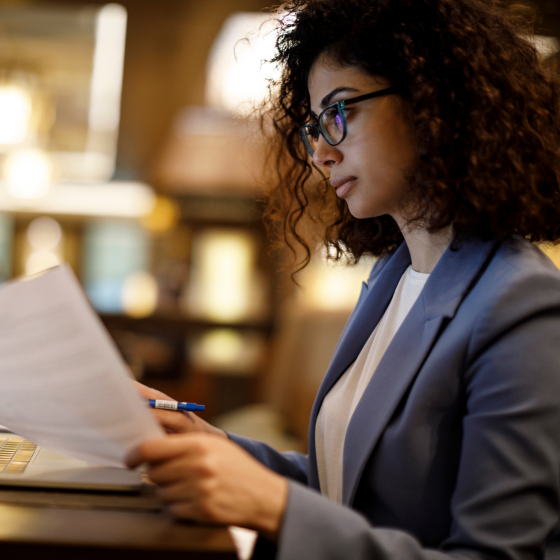 A financial professional reviewing information about the Protective Advisory Fee Deduction Program.