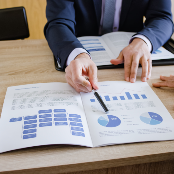 A financial professional showing his client the investment options available with Protective Investors Benefit Advisory Variable Annuity NY.