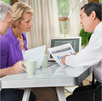 Financial professional sharing current annuity rates with his clients.